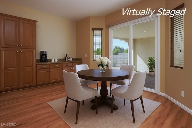 8604 Amber Autumn St, Las Vegas, NV 89131 - dining room with light wood-type flooring and baseboards