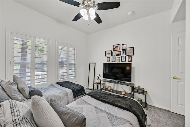 10640 Amber Ridge Dr Unit 101, Las Vegas, NV 89144 - bedroom with multiple windows, carpet floors, and ceiling fan
