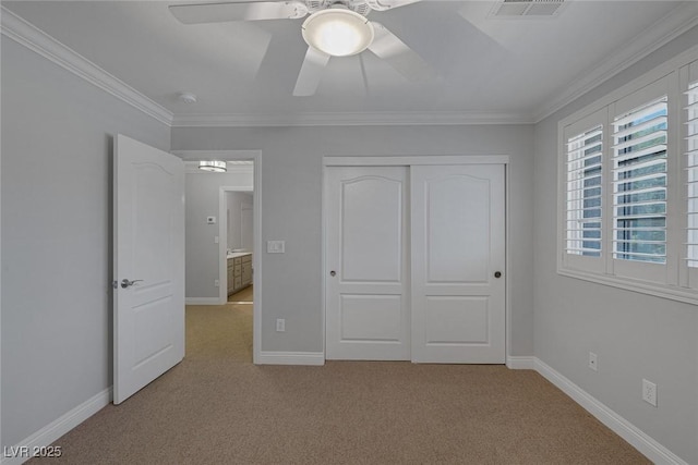 12 Golden View St, Henderson, NV 89012 - unfurnished bedroom with light carpet, crown molding, a closet, and a ceiling fan