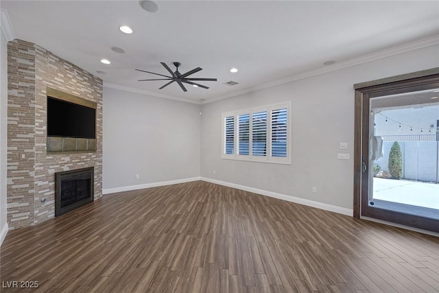 12 Golden View St, Henderson, NV 89012 - unfurnished living room with dark wood-type flooring, ceiling fan, recessed lighting, a large fireplace, and ornamental molding