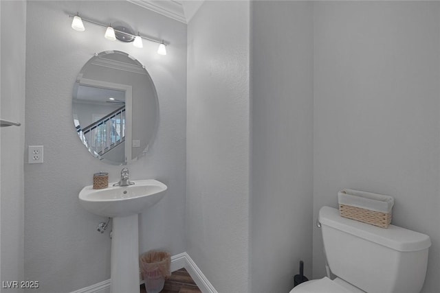 12 Golden View St, Henderson, NV 89012 - half bathroom with toilet and ornamental molding