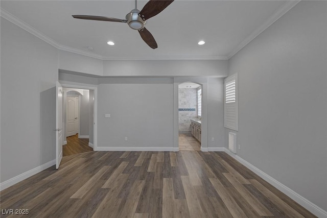 12 Golden View St, Henderson, NV 89012 - unfurnished bedroom featuring arched walkways, crown molding, wood finished floors, recessed lighting, and connected bathroom