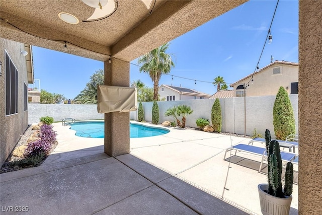 12 Golden View St, Henderson, NV 89012 - view of swimming pool featuring a fenced backyard and a patio area