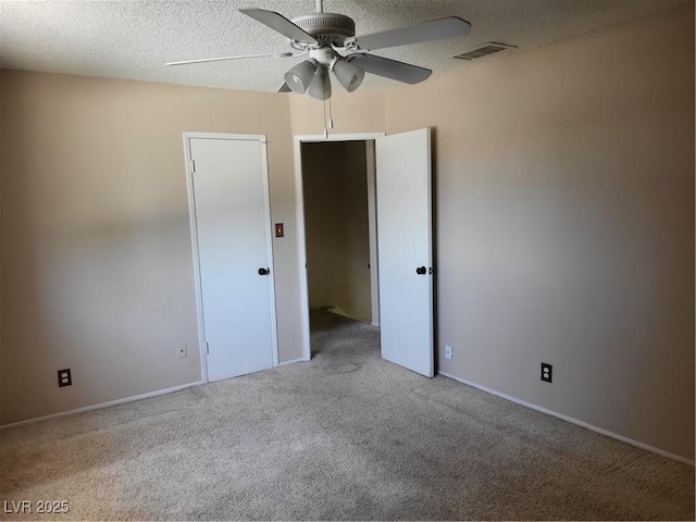 745 Greenbriar Townhouse Way, Las Vegas, NV 89121 - spare room featuring a ceiling fan, carpet flooring, and a textured ceiling