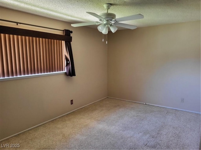 745 Greenbriar Townhouse Way, Las Vegas, NV 89121 - carpeted empty room featuring a ceiling fan and a textured ceiling