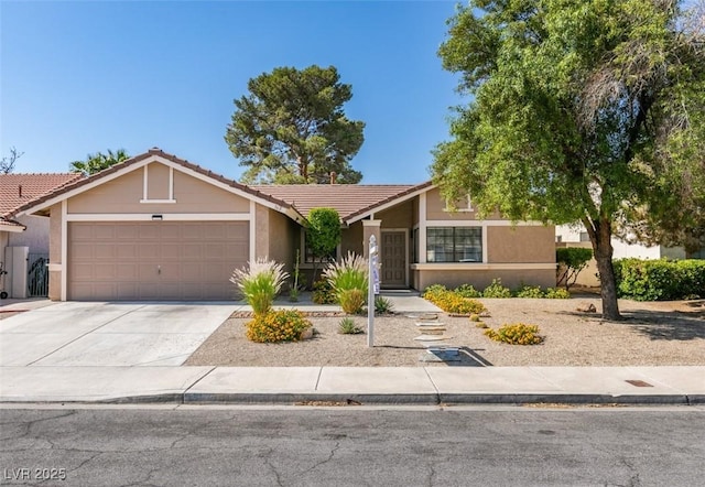 368 Umbria Way, Henderson, NV 89014 - view of front of property featuring a tile roof, an attached garage, and stucco siding