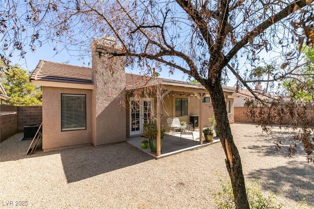 368 Umbria Way, Henderson, NV 89014 - back of house featuring a fenced backyard, stucco siding, a patio, and a tiled roof