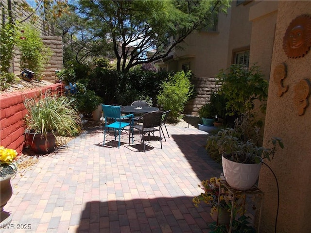11832 Arenoso Dr, Las Vegas, NV 89138 - view of patio / terrace with outdoor dining space