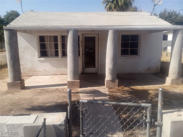 192 W Alma Ave, Overton, NV 89040 - view of front of property featuring a fenced front yard, a gate, and stucco siding