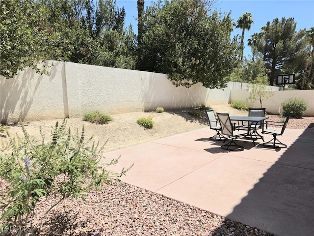 2366 Brockton Way, Henderson, NV 89074 - fenced backyard with outdoor dining space and a patio