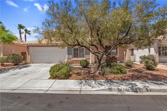2366 Brockton Way, Henderson, NV 89074 - obstructed view of property featuring driveway, an attached garage, stucco siding, and a tiled roof