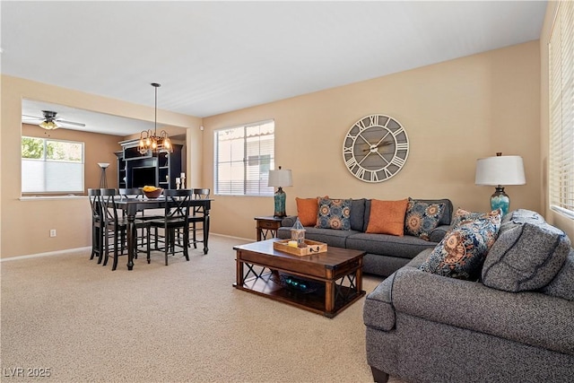 2366 Brockton Way, Henderson, NV 89074 - living room featuring carpet flooring, ceiling fan, and a chandelier