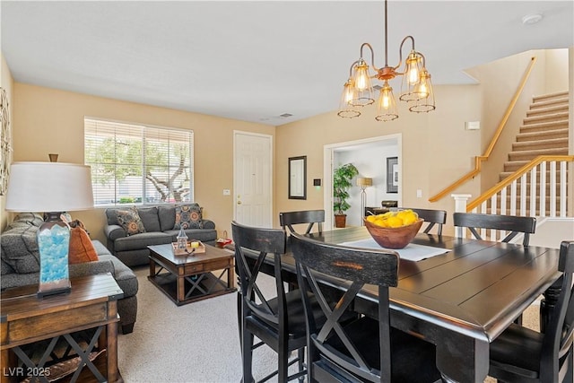 2366 Brockton Way, Henderson, NV 89074 - dining space featuring stairs, a chandelier, and carpet