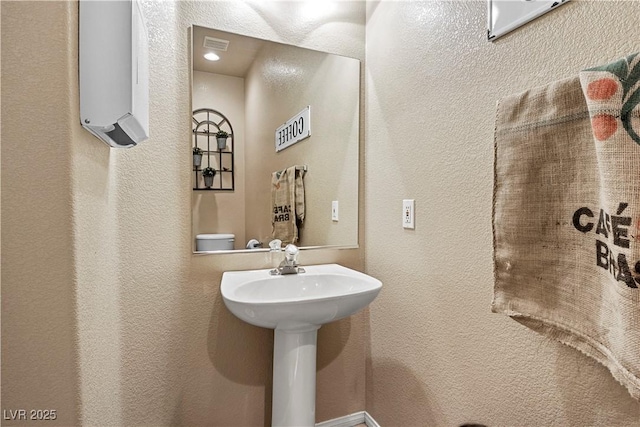 2366 Brockton Way, Henderson, NV 89074 - half bathroom featuring a textured wall