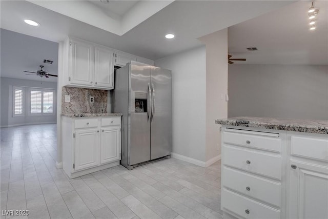 1516 Frandosa Ln, Las Vegas, NV 89117 - kitchen with stainless steel fridge with ice dispenser, a ceiling fan, backsplash, white cabinets, and recessed lighting