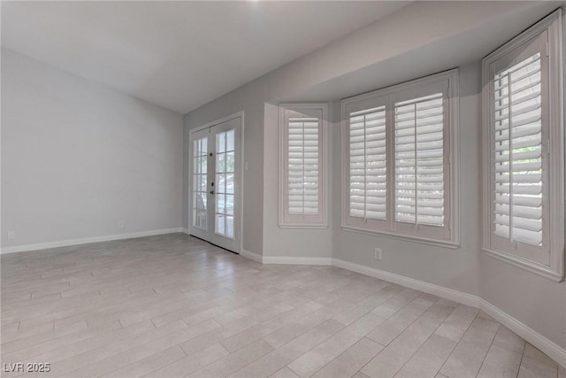1516 Frandosa Ln, Las Vegas, NV 89117 - unfurnished room featuring french doors and light wood-type flooring