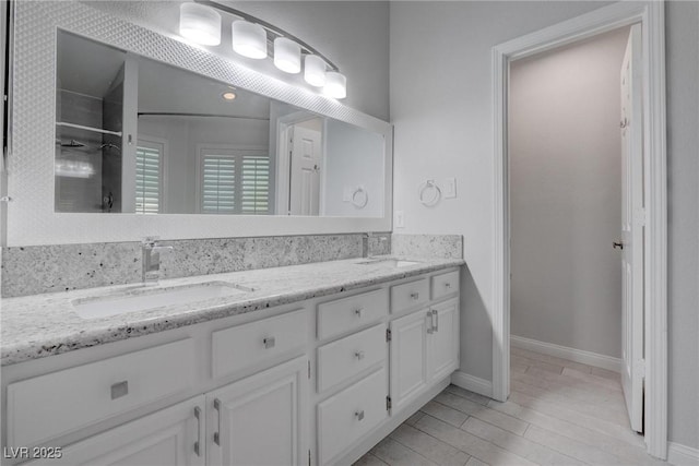 1516 Frandosa Ln, Las Vegas, NV 89117 - full bath featuring double vanity, wood finished floors, and a shower