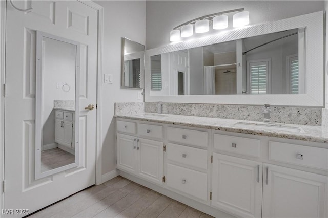 1516 Frandosa Ln, Las Vegas, NV 89117 - full bath featuring double vanity, a shower with curtain, and wood finished floors