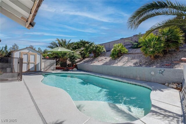 1516 Frandosa Ln, Las Vegas, NV 89117 - view of pool with a storage unit, a fenced backyard, and a patio