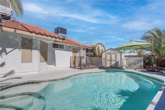 1516 Frandosa Ln, Las Vegas, NV 89117 - view of swimming pool with a shed and a patio area