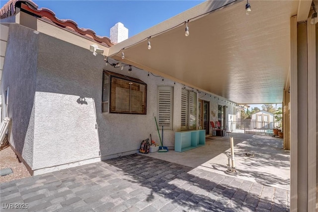 1516 Frandosa Ln, Las Vegas, NV 89117 - view of patio / terrace featuring a shed