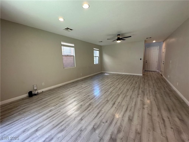 7537 Brisa Del Mar Ave, Las Vegas, NV 89179 - spare room with ceiling fan, wood finished floors, and recessed lighting