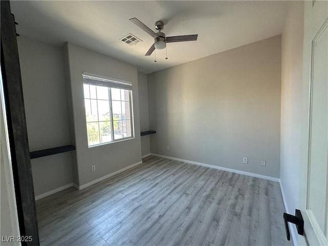 7537 Brisa Del Mar Ave, Las Vegas, NV 89179 - unfurnished room featuring ceiling fan and light wood-style flooring