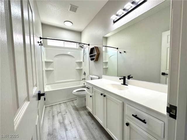 7537 Brisa Del Mar Ave, Las Vegas, NV 89179 - full bath with vanity, shower / bath combination, and wood finished floors