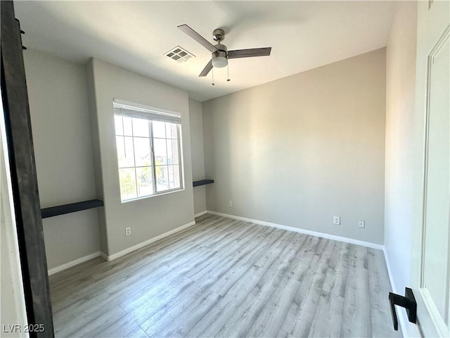 7537 Brisa Del Mar Ave, Las Vegas, NV 89179 - unfurnished room featuring a ceiling fan and wood finished floors