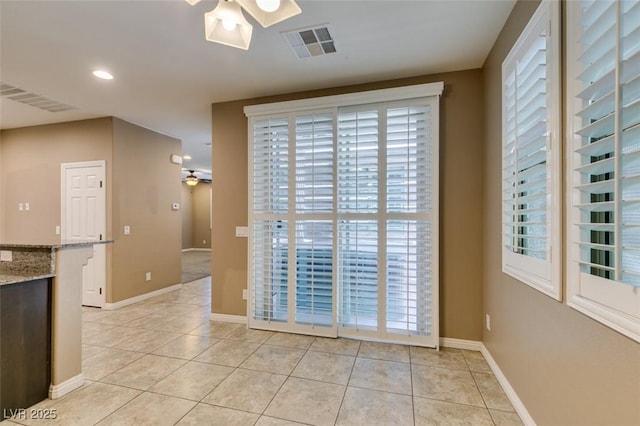 11063 Mount George St, Las Vegas, NV 89179 - unfurnished dining area featuring ceiling fan, light tile patterned floors, and recessed lighting