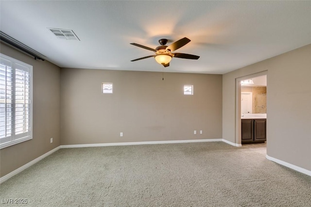 11063 Mount George St, Las Vegas, NV 89179 - unfurnished room featuring a ceiling fan and light carpet
