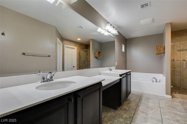 11063 Mount George St, Las Vegas, NV 89179 - full bathroom with a shower stall, double vanity, a bath, and tile patterned floors