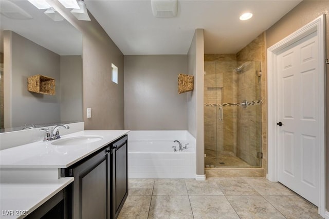 11063 Mount George St, Las Vegas, NV 89179 - bathroom with a garden tub, vanity, a stall shower, tile patterned floors, and recessed lighting