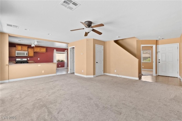 9175 Titan Hill Ct, Las Vegas, NV 89148 - unfurnished living room featuring light colored carpet and a ceiling fan