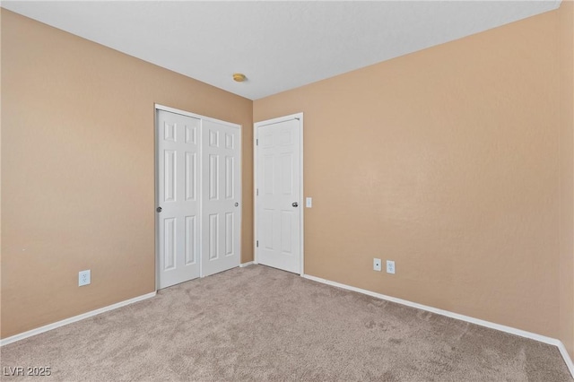 9175 Titan Hill Ct, Las Vegas, NV 89148 - unfurnished bedroom featuring carpet and a closet