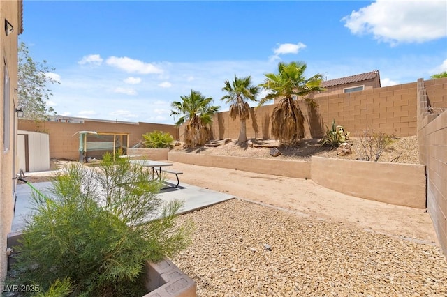 9175 Titan Hill Ct, Las Vegas, NV 89148 - fenced backyard featuring a patio