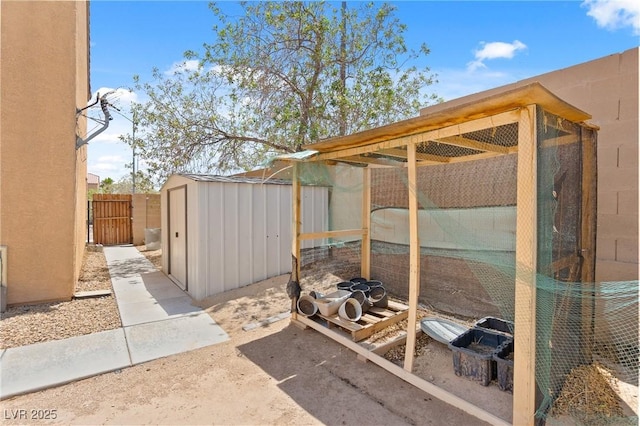 9175 Titan Hill Ct, Las Vegas, NV 89148 - view of patio / terrace with a shed