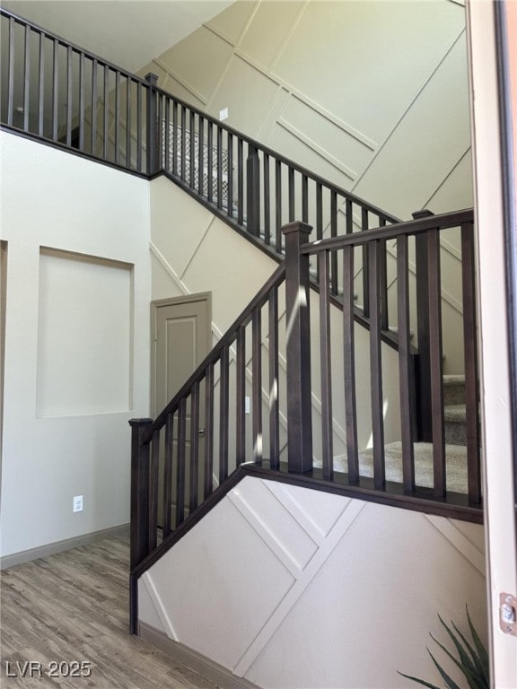 2645 Cava Tirreni St, Henderson, NV 89044 - stairs with wood finished floors and baseboards