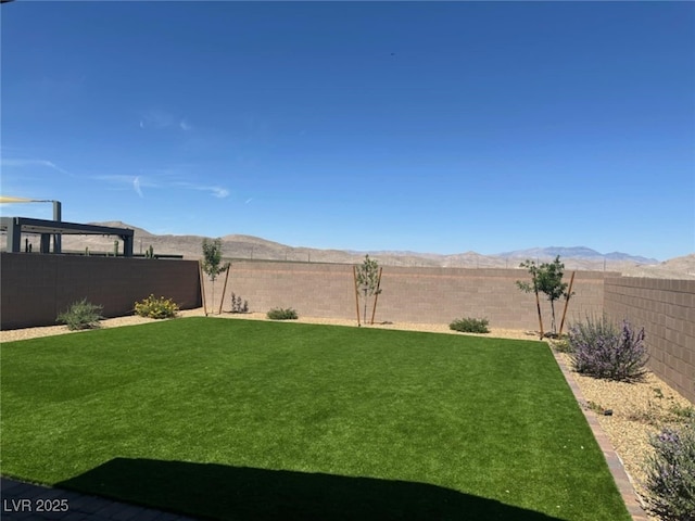 2645 Cava Tirreni St, Henderson, NV 89044 - fenced backyard featuring a mountain view