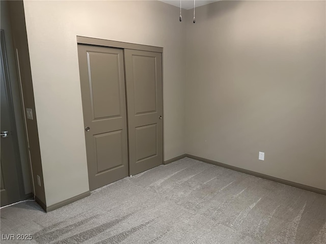 2645 Cava Tirreni St, Henderson, NV 89044 - unfurnished bedroom featuring light carpet and a closet