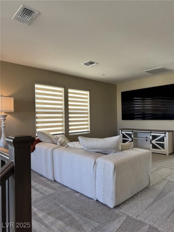 2645 Cava Tirreni St, Henderson, NV 89044 - living area featuring carpet flooring