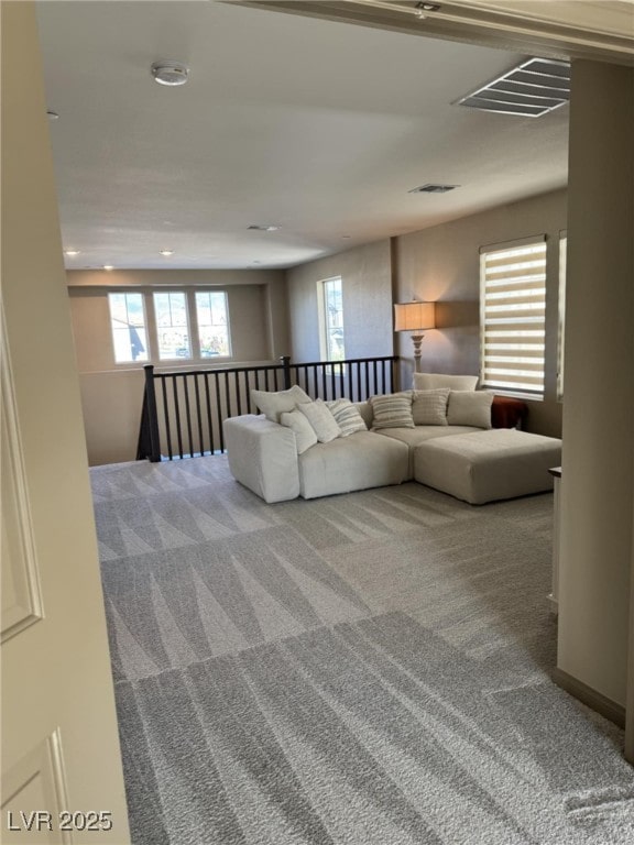 2645 Cava Tirreni St, Henderson, NV 89044 - living room featuring carpet