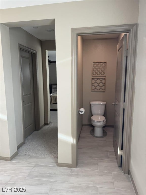 2645 Cava Tirreni St, Henderson, NV 89044 - bathroom with toilet and baseboards