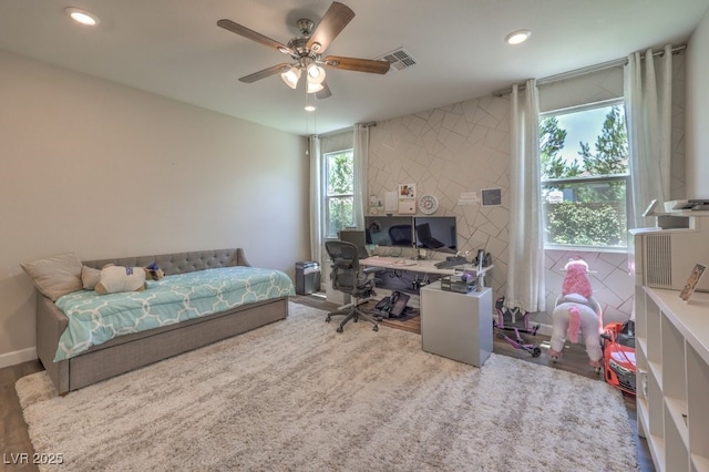 9785 W Meranto Ave, Las Vegas, NV 89178 - bedroom with an office area, a ceiling fan, recessed lighting, and wood finished floors