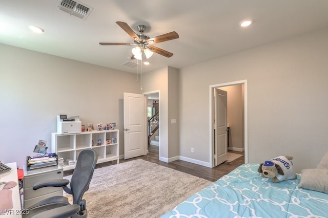 9785 W Meranto Ave, Las Vegas, NV 89178 - bedroom with dark wood finished floors, recessed lighting, a desk, and ceiling fan