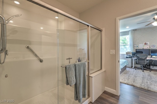 9785 W Meranto Ave, Las Vegas, NV 89178 - ensuite bathroom with wood finished floors, ceiling fan, and a stall shower