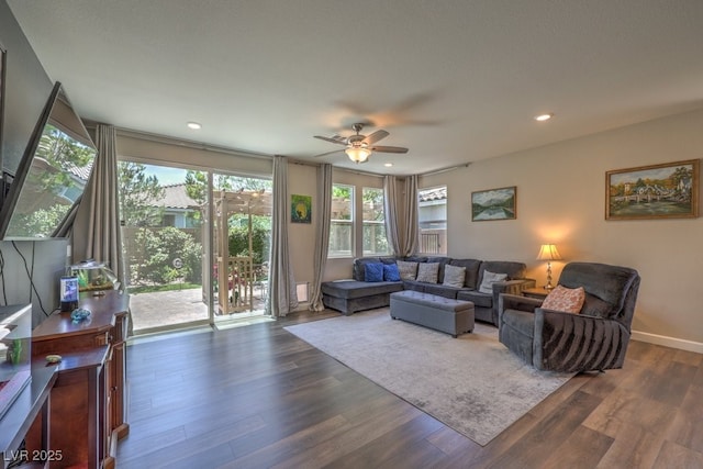 9785 W Meranto Ave, Las Vegas, NV 89178 - living area featuring a ceiling fan, dark wood-style floors, healthy amount of natural light, and recessed lighting
