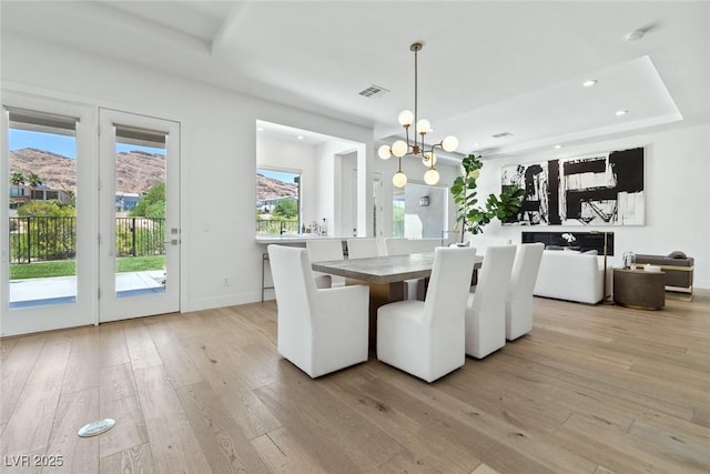 2797 Turtle Head Peak Dr, Las Vegas, NV 89135 - dining room featuring a chandelier, light wood finished floors, and recessed lighting