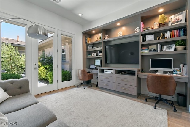 2797 Turtle Head Peak Dr, Las Vegas, NV 89135 - office area with built in study area, light wood-type flooring, and recessed lighting