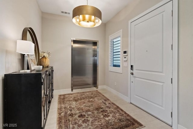 120 Los Cabos Dr Unit 301, Las Vegas, NV 89144 - foyer with elevator and baseboards